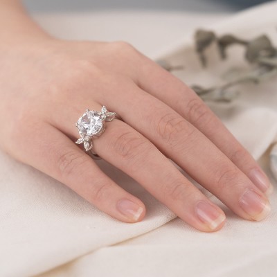 Flower Inspired Oval Cut White Sapphire Sterling Silver Engagement Ring